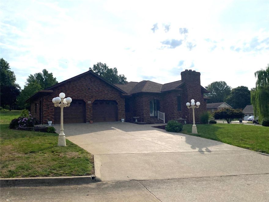 Live the life of luxury in one of the most desirable areas of town. All brick, 3 BR, 3 BA home sitting on a beautiful corner lot will have you ready to move. Walking through the front door you will notice the open dining and sunken living room complete with a cozy wood burning, brick, floor to ceiling, fireplace. Continue through the home into the kitchen or go through the French doors out to the covered patio. Outside you will notice the landscaping and flower oasis. Off the kitchen you will find the main level laundry room which leads you to the 28X26 attached 2 car garage. The master BR suite will not leave you out of room, there is plenty of space for your clothes and shoes in the walk-in closet and additional space for all your furniture needs. Downstairs in the full, mostly finished basement you will find the 3rd BA and additional living space for more entertaining, a hobby room/area, or you could even add a 4th & 5th BR, with easy finishing touches.