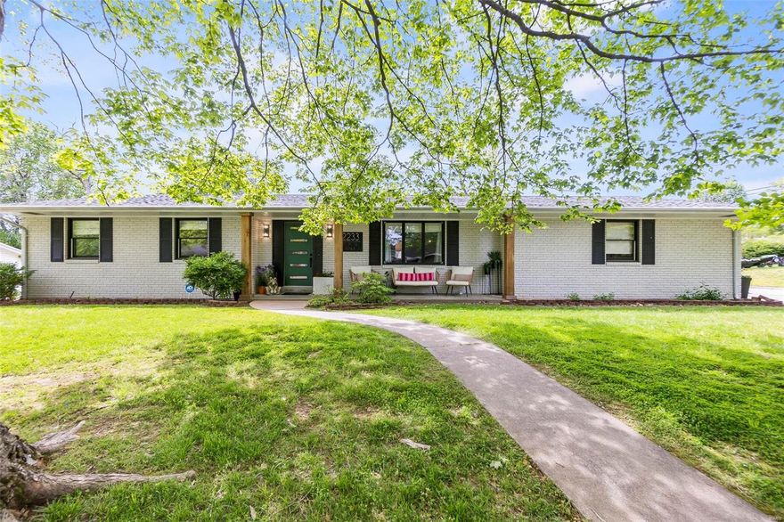 Completely remodeled all brick homes on a corner lot in Alma Schrader school district.  2,400 square feet just on the main floor brings a perfect blend of traditional charm with the “pops" of modern flair throughout.  Take your pick from the 3 different main floor family rooms, front living room with dining room, the den with a black stone fireplace or the great room full of windows overlooking the backyard. New kitchen with stainless steel appliance, all bathrooms have been remodeled, master suite has tiled walk in shower. New wood flooring! Unique barn/sliding doors, custom ordered light fixtures, modern garage door and a unique style set's this home apart from the rest! Basement is finished with what is used as a 4th bedroom, with an additional 3rd full bath, plus lots of extra space for storage and walks up to the backyard.  Located on a nice flat corner lot with a private outdoor patio. Main level laundry. Don’t miss this one - great location + superb condition + unique style !