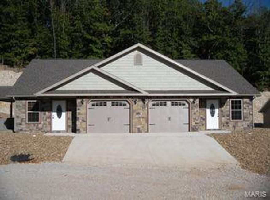 Beautiful high-end duplexes! Top grade building materials, high efficiency HVAC. Very well insulated so low cost to heat & cool. Accented paint colors w/ deluxe trim work throughout entire home w/ fine carpet/tile/wood flooring. Beautiful kitchen w/ lots of cabinet space. Double closets in the master along w/ walk in shower w/ double head. Onyx vanity tops. Washer-dryer & water softener included w/ home. each unit has a one car garage with upgraded architectural garage door. These duplexes were built by a custom home builder and cannot be compared to spec houses! Quiet country setting with no thru roads. Very low maintenance rock landscape. These units have great potential for a pure investment, or for the new owner to live in one side and rent the other out to pay the mortgage. High end homes attract high end renters!! PRICED TO SELL!!!