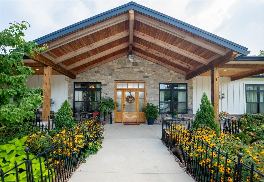 Ultra private sprawling ranch in Augusta on 13+ acres of wooded/open land offering more than 3,700 SQFT of luxury living, less than 30 minutes from Chesterfield! High ceilings & wood beams in the kitchen, including the great room, anchored by a floor-to-ceiling stone fireplace flanked by windows with stunning views. A Chef's kitchen has endless custom cabinets, granite counters, & black SS appliances, including double wall ovens & ice maker. Curl up by the fire in the hearth room. The master suite is large and beautifully put together with a walk-in closet & ensuite bathroom with soaking tub & oversized shower! The home is fitted with radiant in-floor heat, along with a private, accessible suite with roll-in shower. The property has trails cutting around it and the horse barn is a perfect place to keep your animals out of the weather. Come see this beautifully maintained home today! Some Accessible Features Additional Rooms: Sun Room