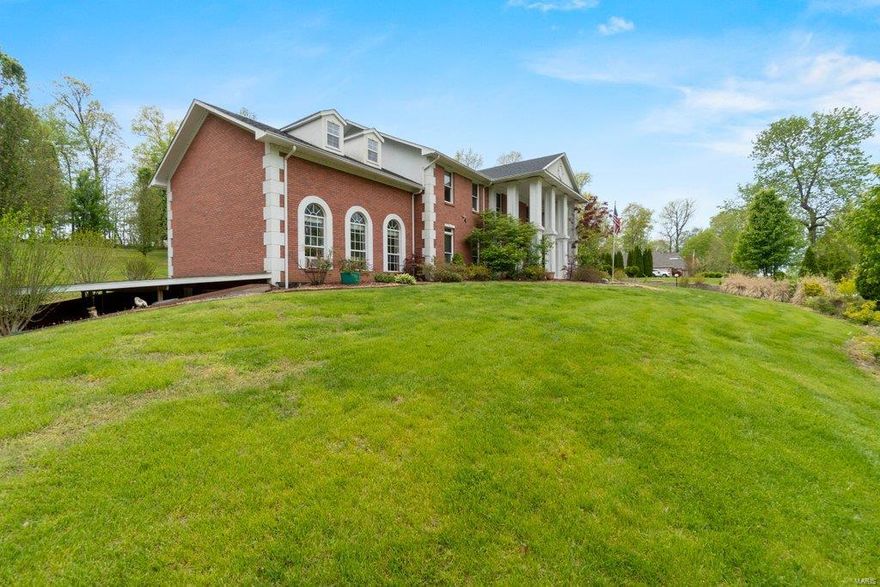 Stake your claim in this spacious grand brick home in Windwood Lake Estates.  Just minutes from Dalhousie golf course, this home offers space for 8-10 vehicles, and a 3000 sq ft space for future mother in law suite.  This 2 acre lot is sure to please if you want space surrounding you.  Don't forget about the in-ground pool!  Just in time for summer.