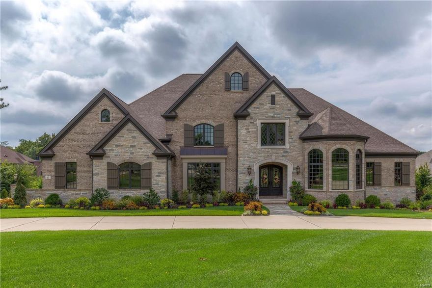 Exquisite European-styled Estate home! New-built 1.5 Sty features over 8500 sf of living space enhanced by superb craftsmanship & high tech integrated systems. Extraordinary 8’ wrought iron double doors lead to grand 2-sty marble foyer with dramatic sweeping staircase, paneled library with custom built-ins, coffered dining room & spectacular great room with 13’ box beam ceiling, stone fireplace, wet bar & wine cellar. State-of-the-art kitchen with cherry cabinetry, professional quality appliances & 14’x4’ center island adjoins breakfast room with atrium door to veranda. The master bedroom suite is a haven of luxury with wide bay window & marble bath with spa shower. Front & rear staircases access 4 additional bedrooms, 2 with ensuite baths & 2 with Jack n’ Jill bath. Walk-out Lower Level includes recreation room with wet bar, family room with stone fireplace, workout room, laundry & full bath. Impeccably landscaped 1.3 ac grounds feature veranda, lanai, heated pool & 4 garage spaces. Additional Rooms: Mud Room