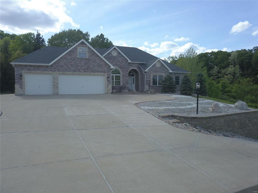 Here is your chance to own a home adjacent to Hole #16 at Sugar Creek Golf Course. Large Atrium Ranch with 3 car garage on a One Acre Lot  that's beautifully landscaped  and views of the course. Hardwood Floors , Vaulted Ceiling, Granite Kitchen Counters, with Island and custom cabinets, Main Floor Laundry. Main floor master suite with Jacuzzi Tub, Separate Shower and Double Vanity Sink and walk in Closet.  Separate Formal Dinning area and breakfast area that walks out to your private patio and screened in porch. Need more outdoor room? Then use your Atrium walkout to your patio and lush yards. Driveway has Street Heat Installed and Home is wired for you to have your own generator.