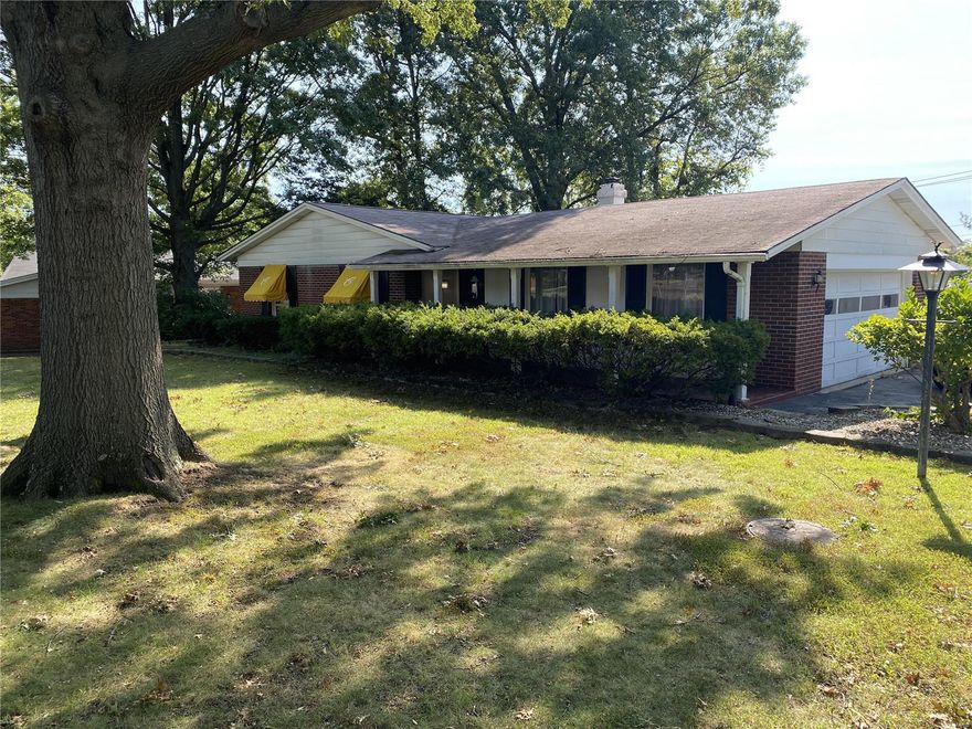 LARGE Ranch home in Hazelwood East. Property has two additional connecting lots. 5 Bedrooms with master suite, large Family Room with fireplace and Living Room. Partial finished basement with full bath. Home has great bones and needs updates and TLC. AS IS Sale, seller to do no inspections (including StL Co), repairs or provide warranties. VERY friendly & skittish dog Callie may be in the back yard.