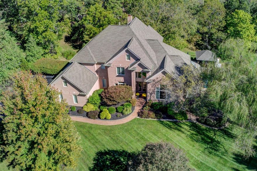 Wow, looking for that resort-style house with a custom pool, jumping rocks, waterfall, outdoor kitchen and bar, separate firepit area, screened in porch with fireplace and infrared heaters for year round enjoyment, 500+ bottle walk in wine cellar, a tree house for the kiddos, and a house built for entertaining . This 1.5 story house with windows galore overlooking the park-like back area is waiting for you in the Kingspointe subdivision. Starting from the minute you walk into the home, an office with custom book shelves to the great room overlooking the beautiful outdoor area.  All bathrooms are updated and the master bath has a spa-like feeling with a walk through double shower. Kitchen and hearth room has a see through fireplace shared with the great room and a mud room with lockers to keep organized. The lower level has an additional 5th bedroom, fabulous rec room with fireplace, arcade, gym, a beautiful bar area and an unbelievable wine room. This house will be a joy to show. Additional Rooms: Wine Cellar