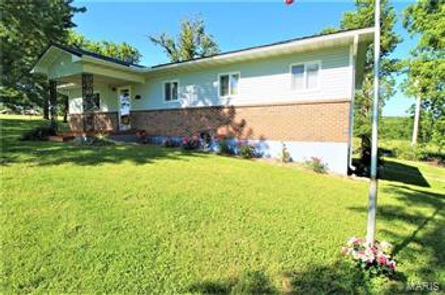 Looking to live in the country? This might be the one!! This home has 3 bedrooms, 3 full baths, full basement with a brick wood burning fireplace and over 1 acre lot with mature trees! New flooring in Kitchen and laundry room, kitchens cabinets have been freshly painted. New gutters 2018, New HVAC in 2017. Home is very well insulted, electric bill will prove that! Home is just outside Richland,  5 minutes from I-44 and just minutes away from the Gasconade River!! Don't miss out on this home, schedule your appointment to see this home before it's to late!