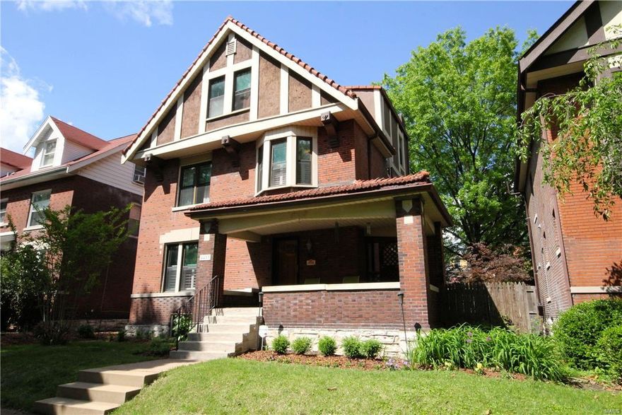 Handsome 1910 Central West End home, elegant red-tile roof, spacious covered front porch, located on quiet cul-de-sac block.  Unique setting, situated back from street with beautifully-landscaped front lawn and walk way.  This home has many original architectural details such as beamed ceilings, pocket doors, fireplace flanked by built-in bookcases, stained glass windows plus oak and pine floors on all three levels.  Updates include thermal-pane windows, plantation shutters, central air (2011), boiler (2005), gas water heater (2011), flue liners & Bellfire fireplace (2014) and master bath (2016).  Wonderfully-updated spacious kitchen with granite countertops, new stainless-steel refrigerator and convection range (2012), plus center island and built-in desk area.  The kitchen leads to a lovely deck, bricked patio, a lushly-landscaped fenced rear yard, and a modern 2-car garage.  Excellent walking location, only 2.5 blocks from Euclid Avenue's cafes, art galleries and shops.