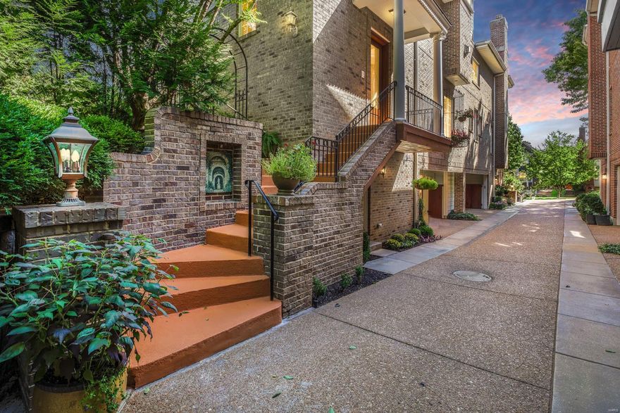 This spectacular, custom built, 3-Story townhome with 3 Bedrooms, 4.5 Baths, & approximately 3,300 square feet of living space, is situated on a beautiful lot, in desirable Old Town Clayton - Top Rated Clayton Schools. This property has been meticulously maintained, & has significant updates throughout, to show off its architectural details, with an elevator servicing all floors. The whole home is painted in stylish, designer colors, making this home truly move-in ready. You will be speechless from the moment you enter, & you will know you are home. Relax out back on the charming stamped concrete patio, in your own private, fully-fenced-in oasis, complete w/ a pond & waterfall, as well as lush landscaping! Great Location – a 5 minute walk to Downtown Clayton restaurants, shops, galleries, & a 10-minute drive to Washington University, Barnes-Jewish Hospital, Forest Park, & the Delmar Loop. Easy access to major highways, & St. Louis Lambert International Airport!
