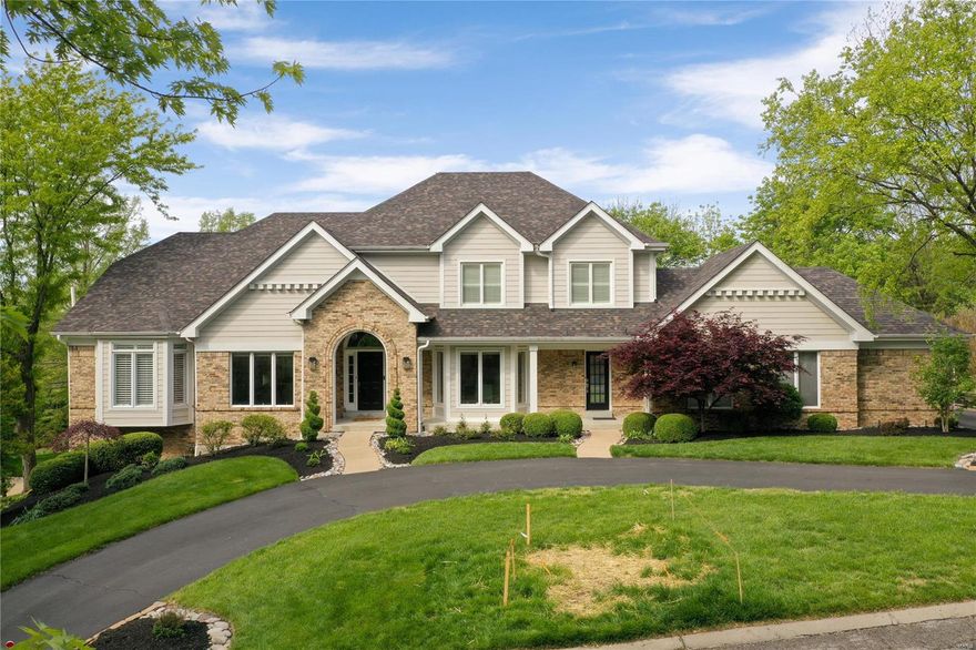 Beautifully appointed 1.5-story home on a private street w/ an open floor plan & picturesque views of lush landscaping. A perfect blend of modern luxury & stylish design. Offers 4 bedrooms & 4 full, 2 half baths w/ over 4800 Sq ft of living space. Enter the 2-story entryway w/ a decorative chandelier, beautiful wood floors, office /LR & a spacious dining room.  The stunning 2-story great room has palladium windows, gas FP & coffered beam ceilings that flow seamlessly to the gourmet kitchen w/ 42 “white cabinets, a center island, granite & Stainless steel appliances, a breakfast area & a French door to a patio w/ a pergola & pizza oven. Main floor primary suite has an updated spa-like bath & a large custom-designed walk-in closet. The 2nd floor has an ensuite bedroom, & 2 other BRs share a large, updated bath. Finished walk-out LL w/ family area w/ a gas FP, wet bar, full bath, rec area & fitness room, lots of storage. 3 car garage, outdoor lighting, Close to shopping, dining, hospitals Additional Rooms: Mud Room