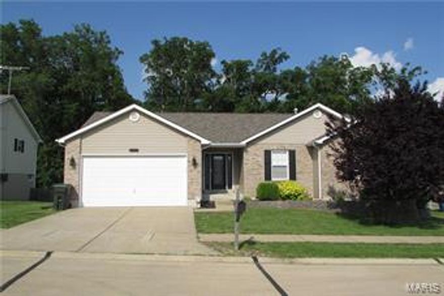 Check out this beautiful ranch home complete with tons of upgrades and custom finishes! The open floor plan with vaulted ceilings is perfect for entertaining. Amazing custom kitchen features; tall cabinets, breakfast bar, pantry, backsplash, upgraded fixtures and switches. Master bedroom suite has huge walk in closet and master bath with jetted tub and walk-in shower. Don't miss the spacious composite 24x16 deck and covered patio with surround sound! This home is also complete with a fully finished lower level featuring; laminate hand scraped wood floors, custom bar, huge recreational room and amazing custom bathroom featuring a focal point shower!