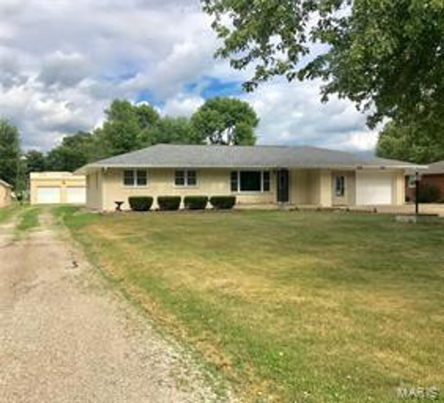 Beautiful, immaculate, all brick ranch sitting on .41 acres. Open the door to the spacious foyer and into this completely remodeled home. Brand new kitchen with an abundance of maple cabinets and stainless steel appliances. New main baths, large main floor laundry, roof (6 years old), central air (2008), high efficiency windows and doors (2009), new carpet in bedrooms/hallway/stairs (2018). New laminate flooring throughout. Each room has its own thermostat. Basement is open and ready for an updated family room. Two rooms in the basement are used as bedrooms(12x14 and 13x14) (no egress). Plenty of extra storage. Outside is landscaped with back patio off of dining room. 24x36 metal garage with 2 overhead doors and 110 service. So much to see in this home. Nothing left to do, but move in! It is a MUST see! Other heat is radiant heat throughout with electric baseboard heat in the basement.