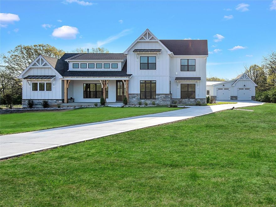STUNNING, NEW, 1.5 story modern farmhouse on 5+/- acres by Lux Move in Ready Dreams Homes 4 bdrm, 3.5 bath w/3,400+/- sqft of living space offers 5¼” baseboards. Perfect floor plan for entertaining. Brick raised hearth gas FP, shiplap ceiling w/beams, & 12’ lanai dr to screened-in porch. Gourmet kitchen w/SS appli, cust soft close cabs & drawers, 5-eye gas range & hood, honed & quartz counters, center island, butler’s pantry & walk-in cust pantry. 1st Floor master feat a 12’ vaulted shiplap ceiling w/beams, white oak wood flooring & lavish bath w/dual vanities, shower, tub & cust walk-in closet. Completing the ML, is an office & a laundry rm. UL has 3 add'l bedrooms each w/carpeting, 1 utilizes hall full bath & other 2 share Jack-n-Jill, an open loft area & bonus/play rm. Unfinished basement has great potential w/2 egress windows, 9’+ ceiling, roughed-in bath & a sump pump. Outside enjoy a level yard, 2-car detached garage, & patio. Close approx HWY 70 & Wentzville amenities (20 min)!