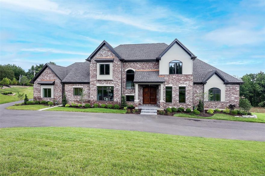 Impeccably curated by Rehnquist Design & Build. 5Bed 7Bath home on 1.95 acres. Gracious 2story Foyer opens to wainscoted Study w/ fireplace & MainHallway. Hearth/Family room w built-in bookcases & gas fireplace opens to Breakfast Room w wet bar & wine chiller. Wall of windows overlooking rear landscape. Formal Dining Room w add'l beverage bar & storage. Epicurean eat-in Kitchen w natural stone countertops, center island, 6burner Wolf gas range, full-size Sub-Zero fridge & freezer, 2 integrated Asko dishwashers & walk-in pantry. Light-filled Breakfast Room open to rear raised patio & outdoor Family Room. MainloFor Master suite with luxurious natural stone clad bath & two spacious walk-in closets. Add'l ensuite Guest Bedroom & 2 Powder Rooms on 1st floor. MainFloor oversized Laundry Room. Three Ensuite Guest Bedrooms & Bonus Room on Upper Level. Extensive millwork, 10'+ ceilings, recessed lighting & speakers thruout. Finished LL w walk-out, add'l bedroom & 2 roughedin baths. 8car garage