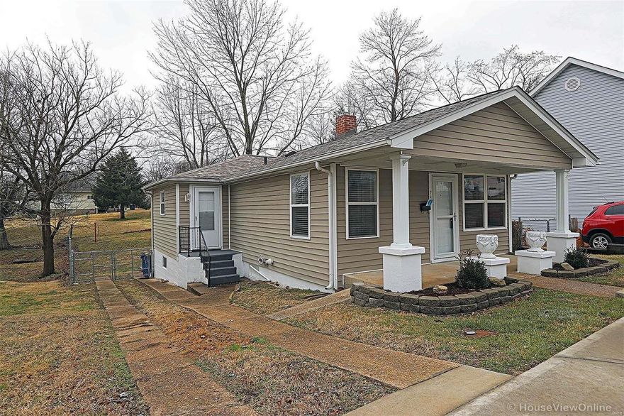 Clean and cute, this 2 bedroom/1 bathroom ranch home has shining wood floors, a large living/dining room, and an eat-in kitchen.  Gas range and dishwasher.  Covered front porch, newer back deck, fully fenced back yard, and full, unfinished walk-out basement.  Great starter home!  Very affordable monthly heating and cooling bills.