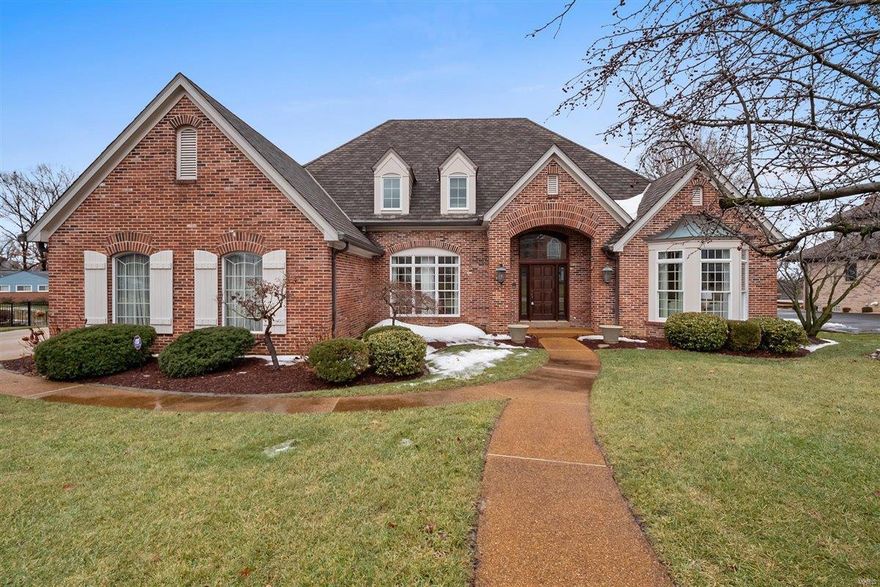 Nestled on a private, beautifully landscaped lot in the heart of Sunset Hills, this stunning 1.5-story brick home offers 3,951 sq. ft. of elegant living space. Built in 1994, this gorgeous home features 4 spacious bedrooms, including a luxurious main-floor master suite, and a thoughtfully designed layout perfect for everyday living. Sunlight fills these expansive spaces, with beautiful windows, hardwood floors, lovely millwork, and soaring ceilings highlighting the main living areas. The kitchen, complete with custom cabinetry and granite countertops, flows seamlessly into a cozy hearth room with a vaulted wood ceiling. A grand staircase leads to 3 additional bedrooms and 2 full baths. Enjoy the outdoors on the aggregate patio, which overlooks a level yard that would work perfectly for a pool! Don't miss the partially finished lower level, main floor laundry & attached 3-car garage. Conveniently located near top-rated Lindbergh schools, shopping, and churches, this home is a true gem! Additional Rooms: Mud Room