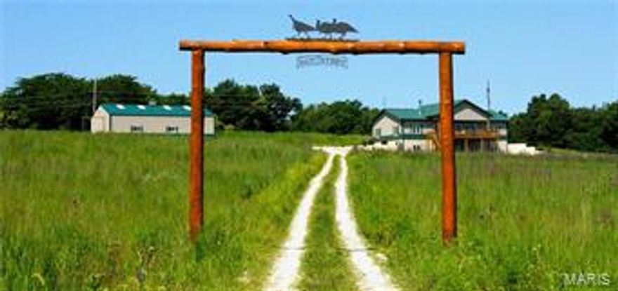 Rut and Strut Hunt Club is a private club 410 +/- acres in Lewis County, MO, located 8 miles N. of Canton, MO. The 7 BD, 4 BA custom built lodge will easily accommodate 16 guests. Completely up to date & ready for the next owner. Public utilities include water & electric. Also phone, satellite television & internet service. Great room encompasses the living, dining &kitchen areas w/ tongue & groove finish vaulted ceiling, hardwood floors, & large stone fire place. Kitchen w/ custom wood cabinets, granite counter tops, stainless steel appliances. 4BD w/ two Jack-and-Jill style bathrooms. Great Room opens to covered deck overlooking native grasses & stone fire pit. Walkout lower level w/a large family room. Mechanical room, a large laundry/locker room, 3BA bedrooms, 2BA. Neighboring properties practice QDMA. If you are looking for an existing mature deer herd, this is the property for you!