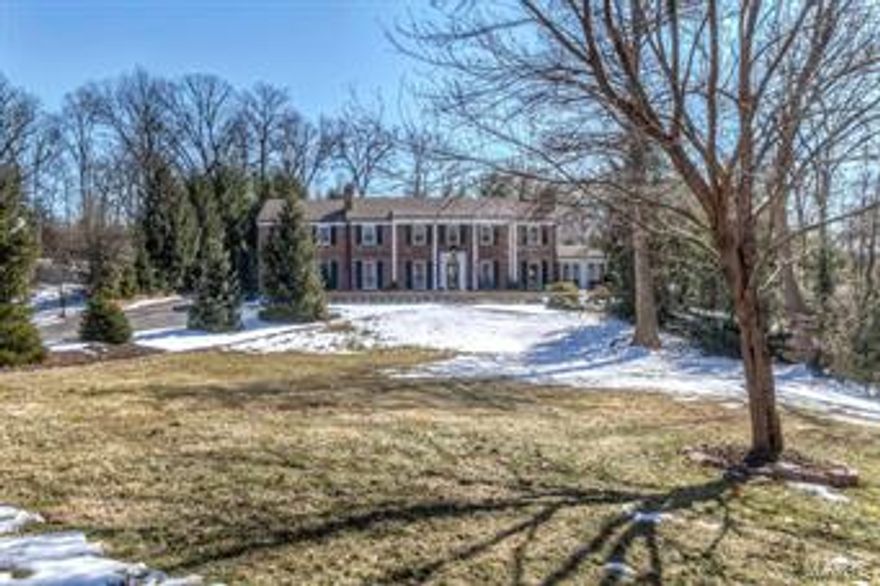 Stunning 5bd/6bth 2-story showplace on picturesque 1.23 acre lot in prestigious Woodcliffe subdvsn! 5300+ sqft of living spc. Foyer leads to cozy Den w/fireplc; beautiful Living Rm w/fireplc; sunlit Florida Rm w/French drs; formal Dining Rm; gourmet Kitchen-Brkfst Rm w/ custom cabinets & SS appliances; fantastic Game Rm & 2 Powder Rms. 2nd flr has spectacular coffered Master Ste w/dressing hall w/built-ins, walk-in closet, fireplc, luxury Masterbath w/dbl vanity, jetted tub & separate shower & gorgeous vaulted Sitting Rm; 4 more bedrms; & 2 more full baths. Finished LL boasts Rec Rm w/decorative fireplc, Workout Rm & full bath w/lrg steam shower. Features: custom millwork, 3 wetbars, alarm, inground sprinkler & huge attached heated 4 car garage. Enjoy the extensively landscaped grounds, fantastic brick terrace, inground pool, hot tub & park-like neighborhood! Great location-Ladue School dstrct; near restaurants, shops, art galleries & hwys! Additional Rooms: Sun Room