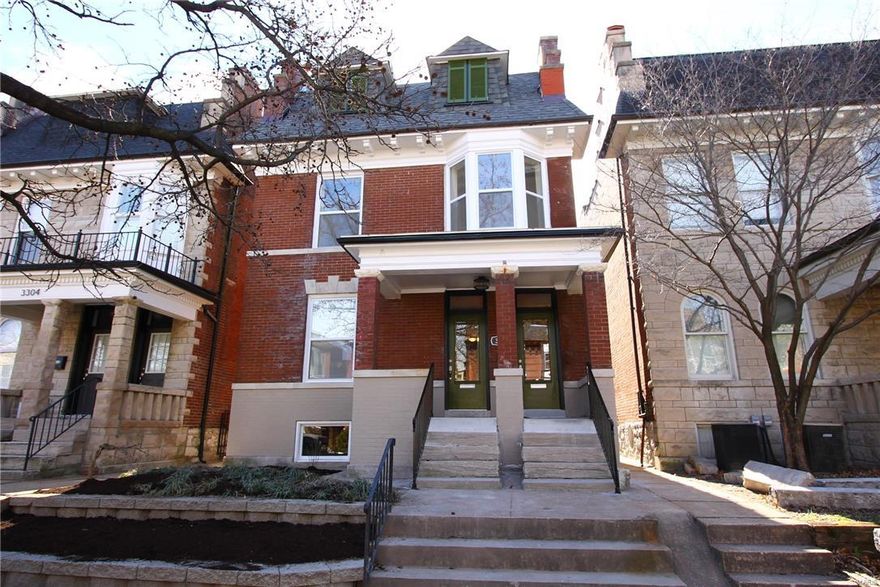 Grand renovation located in historic Tower Grove East! Exposed brick at entry leads to New open floor plan creating fantastic family space & modern updates desired. Delight in custom kitchen with upgraded appliances including 5 burner gas stove, granite counters, custom backsplash, even walk-in pantry. Beverage/wine cooler eases entertaining to open flow of family & dining areas. Front living room has pocket door for more private setting or opens to the entire main level. Solid hardwood flooring or custom tile work throughout this entire home. MAIN FLOOR LAUNDRY! Master suite, a retreat with sitting area, large walk-in, private deck, & Bath that everyone wishes they had with clawfoot tub, massive shower with dual heads, & adult height double vanity. Super secondary bedrooms served by large custom bath with subway tile surrounding tub. Outside enjoy rear yard with privacy fence, o/s double garageport, new sidewalks, large deck. See separate sheet for all system updates. COME SEE TODAY!
