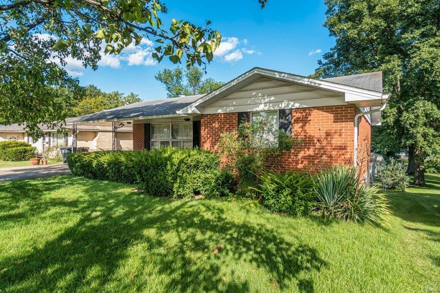 Walk across the covered front porch and through the door and welcome to your MASSIVE living room with beautiful oak wood floors, these floors are confirmed to be in at least two of the three bedrooms under the carpet. Off the kitchen and dining room is a screened in porch, perfect for early morning or evening drinks and entertaining! This home features 2200+- square foot of FINISHED LIVING SPACE between the main level and the finished basement and a large fenced in yard.  Finding this much Square footage for under $130,000 is pretty much UNHEARD of! With some simple personal touches this house could easily be a home! The finished basement features two bonus rooms, two living rooms, a hobby space & a extra FULL size kitchen. Theres so much potential in this home to be updated, or you could live in it as it stands and update it as you go! Don't miss the opportunity to own so much space with a low price tag!