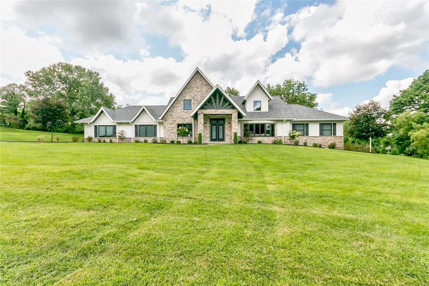 Renovated to Perfection! This 1.5 Story Home is the epitome of Gracious Living! A Glorious, Two Story Staircase graces the Entry that opens to a visual Storybook Classic Home that is designed for effortless entertaining/unparalleled luxury living! A home that’s perfectly positioned in “Chapel Hill”, a prestigious community in Town & Country! Elegantly flanking the Entry is the Living Room/Formal Dining Rooms & leads to Hearth Room & the State-of-the-Art Kitchen w/ Dacor Stainless Appl, Custom Cabinetry/Counters that opens to a Brfst Rm & Hearth Room that focuses on a beautiful Fireplace. Main Flr includes Mstr Bedrm Suite W/ Tray Ceiling, Custom Ensuite Lux Bath & custom Closets! Powder Rm & MFL! Upper Floor has 2nd Mstr Bedrm Suite w/ Lux Bath, 2 large Bedrooms & Hall Bath! Fin LL is a complete Living Apt w/ Full Kit & Bath, 2nd Ldry Rm & private entrance! The 1 Acre lot is a park-like setting; perfect for an Inground Pool & the Covered Patio is the ideal setting for Outdoor Living!