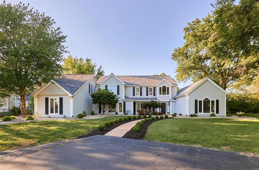 Dramatic contemporary home sitting on a private 1 acre lot with inground pool.  4 Bedroom, 4 ba home with 2-story entry with slate floor and vaulted great room with a wall of windows overlooking the pool, patio and large private lot!  The decor of this beautifully appointed home is neutral and can be transformed to anyones palate.  The huge gourmet kitchen has 12' ceiling, walk-in pantry, stainless steel appliances including a Sub-Zero fridge, dishwasher, trash compactor, range hood, range/oven, icemaker and wine cooler and cabinets galore. Jack and Jill bath between the 2 upstairs bedrooms and a huge rec/media room.  Mstr with newer ceramic tile, 2 walk in closets, double sinks, soaking tub and large shower and an office just off the mstr.  Additional b/r, powder room and laundry round out the main floor.  You'll be entertaining family and friends outside with a large patio and pool. The hot tub is negotiable.