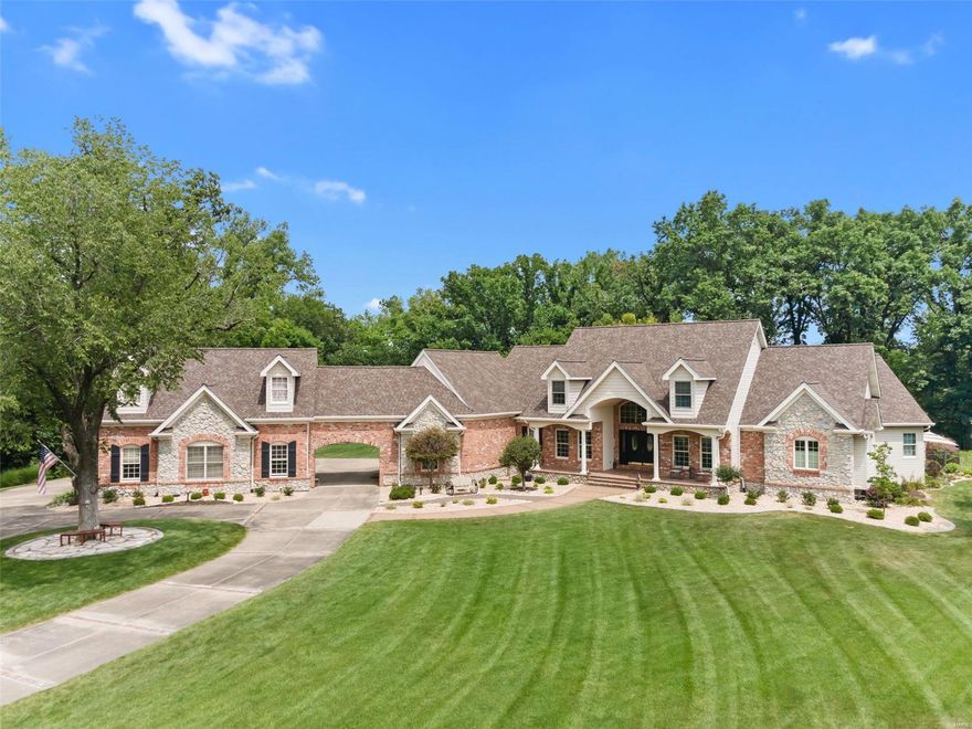 Make Your Dream a Reality! Extraordinary Home on over 3 private acres. Entertain w/an outdoor kitchen (quartzite sandstone cntr top), A 40X20 pool (diving board & slide) & 23X20 Vaulted Pool House Cabana w/Stone Fireplace wired for a Flatscreen. Round the corner through barn doors & enter huge storage area for outdoor accessories. Massive yard allows plenty of room for horseshoes or baseball! This Home is one people dream about. The Main Floor hosts an expansive Kitchen, Beamed Vaulted Hearth Rm, & breakfast area that opens to a Screened Deck. The Great Rm features a Reverse Vault overlooking the pool. Master Ste comes w/walk-in closets, access to the Pool Bath/Dressing Rm, & Master Bath w/walk-in shower & sep.Tub. UL hosts a Theater Rm w/Stadium Seating & Lobby w/Wet Bar and 2 more bdrms. LL is Complete Living Area w/Family & Game Rm, Kitchen, and a 4th Bedroom addition complete w/Office Nook, Egress window, & walk-in closet. Geothermal HVAC provides efficient Heating/Cooling system.