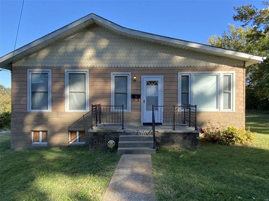 This cozy bungalow has been well loved by it's owners for over 25 years. You will see generous ceiling heights with updated lighting as you walk in the front door. Parquet floors in the living room and dining room. Kitchen is equipped with oak cabinets, gas stove, refrigerator stays. 2 bedrooms with commercial grade carpeting and a bonus room off the kitchen complete the first floor. Detached garage needs work. All systems within the home have been maintained and are fully functional