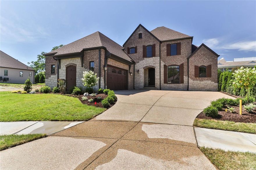 MOVE IN Ready!!! Care Free Living Nestled in the heart of Creve Coeur! European Style Stone & Brick Front w/ Oversized Side Entry Garage. Beautifully Landscaped and Sodded with Irrigation System. Inviting Interior includes 9'+ Ceilings w/Special Design Features, 7' Two Panel Solid Core Doors, Wooden Window Surrounds, Custom Drywall Arches w/Rounded Corners, Satin Nickel Lever Handles. Pamper the Chef w/Custom Designer Kitchen, Energy Star Stainless Steel Kitchen Aid Appliances including Five Burner Gas Cook Top, Built In Drawer Microwave, Sep. Electric Oven, Granite Tops, Walk In Pantry w/Solid Shelving. An Oversized Great Rm features a Gas Fireplace w/Granite Surround & Wood Mantel. The Master Bedroom includes a Luxury en Suite w/His & Her Adult Height Vanities, Granite Tops & Undermount Sinks, Custom Shower w/Tile Base & Surrounds w/Glass Enclosure & Frameless Swing Door. Ladue Schools, Easy Access to Shopping, Entertainment, and Freeways!! Care Free Lifestyle! COOL: 14 SEER+