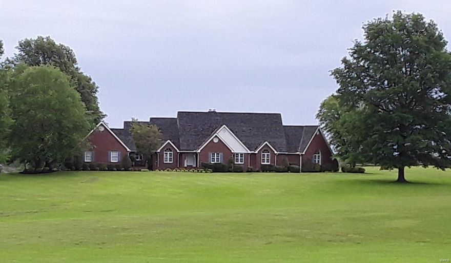 Elegant 17 acre estate with 2 homes plus 2560 shop building, easily could be a shop-house. Beautiful, stately brick main home with 6 bedrooms, 5.5 baths with finished basement with a full 2nd kitchen. Basement is 90% finished. There are stunning views from this quality custom built home,Granite countertops, 2 fireplaces, Geo thermal system, deep well , septic ,& wired for generator. Very nice, 3 could be 4 bedroom guest house, shop building has 2 large overhead doors you could park a RV in, 7 1/2 -8 acres of fenced pasture. No restrictions.