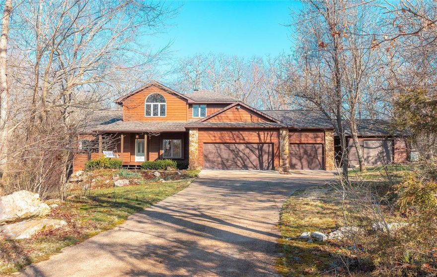 Spacious home in a quiet cul-de-sac nestled on 2.66 acres (+/-) that backs the 8th hole of the golf course. The main floor features the kitchen with a Wolf gas range/oven and Sub-Zero refrigerator, solid surface countertops, island, & formal dining room. Wood flooring throughout, large windows allow for an abundance of natural light. Enjoy a cozy fire at the dual-sided gas fireplace between the living room and the kitchen. The primary suite is impressive with a beautiful bathroom and spacious 13.5' x 14' walk-in closet. So many details to love! Upstairs you will find a loft area perfect for a home office along with a full bathroom and two additional bedrooms. The lower level offers a large family room with its own gas fireplace and wet bar. Three additional bedrooms and a full bathroom along with two spacious unfinished rooms complete the lower level. The home also offers a three-car garage and a John Deere garage. In-ground pool, screened deck, with multiple patios. New Roof in 2020. Additional Rooms: Mud Room