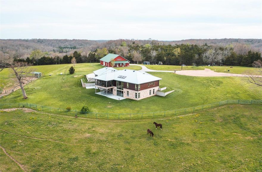 2 Incredible homes! Amazing 6,160 sq/ft custom built home on nearly 10 acres with separate guest home with 1,344 sq/ft, 3bed/1bath living quarters and large garage space. What do you get when an elite, custom-home builder and his wife build a home for their family? An incredible home with a level of attention to detail and efficiency that is second to none. This 4 bedroom, 5 bathroom home was meticulously designed and executed with the result being a level of quality that is rarely seen. This is apparent before you even walk through the breathtaking 8' tall walnut front door. The kitchen features custom tiger-wood cabinetry, quartz countertops, and top of the line appliances by Miele, Northland, Gaggenau and sharp. The master suite makes you feel like you're in a high-end spa with the natural lighting, and steam shower with aromatherapy and built-in speakers. More detailed list of features are included in the photos. Main home only and approx. 7.3 acres also available MLS#23074026 Additional Rooms: Mud Room