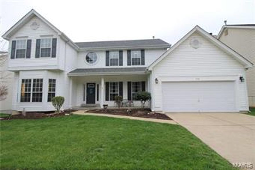 What a house here! With over 2700sq.ft. on the main two floors, plus a finished walkout lower level, there is a lot of house for the price here! The large porch and newer front door greet you as you enter the two-story entry foyer & start walking through the home with 9' main floor ceilings, bay windows, & updates throughout. There is a home office, a great room w/a fireplace & built-in bookcases & is very open to the kitchen which has updated counter tops, wood floors and access to a main floor laundry. The T-staircase takes you upstairs to 4 very size-able bedrooms including a vaulted master suite with huge walk-in closet & dual sinks in the bathroom. The lower level as a family room area, a rec room, a full bath & a wet bar. Walk out to the level backyard on either the deck or the patio and you will appreciate the great lot this house is on. The roof is newer and the sellers are providing a 1yr. home warranty. You will certainly want to tour this home and make it your own!