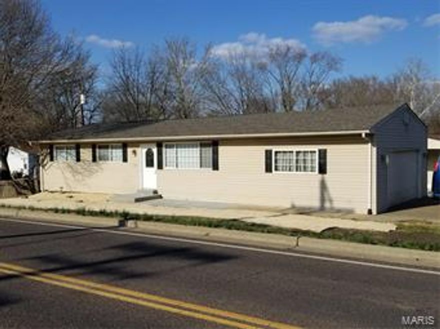 Cute as a bug in a rug! This 3 bedroom home has just been updated & is waiting for you to make it your next home.  This home also has an over-sized 2 car attached side entry garage and a newly shingled roof.  Inside the home you will find 3 spacious bedrooms, spacious breakfast area, and plenty of kitchen cabinetry.  Home has new carpeting and laminate, new granite countertops, new kitchen hardware, door knobs & hinges, new craftsman style doors, new closet shelving, new lighting, updated bathroom w/ reglazed & stylishly tiled shower, new vanity & faucet, new kitchen sink & faucet, new stainless appliances & more. Fenced back yard w/nice patio area.  Unfinished basement is ready for your finishing touches.  Master bed has 2 large closets.  large aggregate driveway.  Great location just minutes from most everything.  Driveway is accessed from Spruce Ct. making it easy to get in and out of the massive driveway!!  AHS Home protection plan included, and Washer & Dryer included as-is.