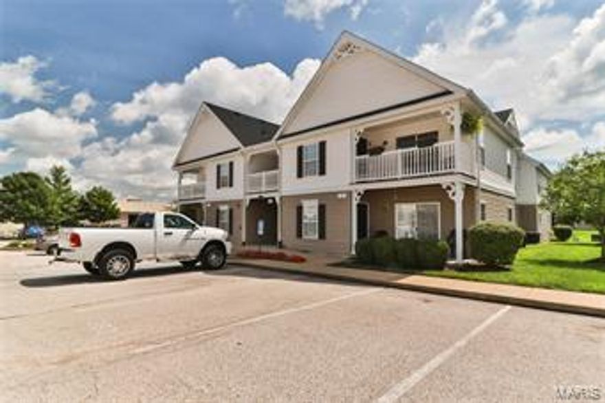 Beautiful first floor condo with an open floor plan! It contains a large master bedroom with a walk-in closet and spacious master bath with step-in shower. This gorgeous condo boasts easy care tile throughout the dining room, kitchen, and both bathrooms. The features don't stop there, it has a large patio with a a great view. Not to mention easy access to the pool, tennis court, basketball pad, with grocery stores, restaurants, and other shopping right next door! This beauty is one you won't want to miss- schedule your showing today! Location: Ground Level, Lower Level, Retail Center