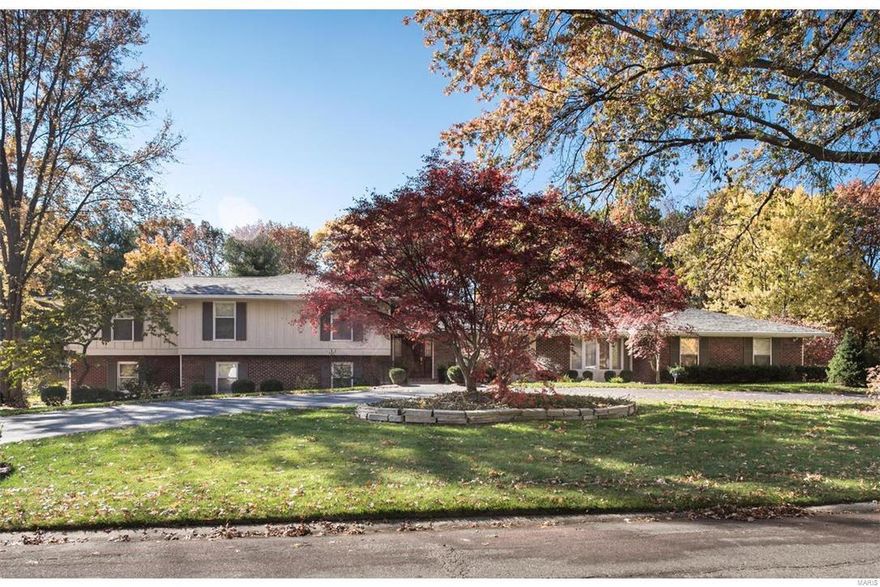 NEW PRICE. MOTIVATED SELLER! (3818 total sq. ft). Numerous updates. 5 bedrm, 6 full baths home. Runnymede subdivision. Amazing 1 acre prop that features transitional style living and manicured grounds. Large circular drive. The first fl offers a large kitchen, hearth/breakfast area, formal living rm & dining rm w/beautiful moldings & bay window. You will love the great rm w/cathedral ceiling, wet bar, entertainment center, nat light and French doors to the patio/pool/back yard. Enjoy flexible multi-level floor plan. Upstairs has a wonderful master suite w/a large bedrm and dressing/sitting rm space w/custom cabinets. The master bath is customized w/his & hers cabinet/closet spaces. 2 more bedrooms and 1 bedroom suite w/bathrm. The lower level has a family rm, a bedrm & a sitting rm, 2 full bathroom's, home office and a laundry rm. Walk down a level to an open play area, utility rm w/cedar closet, new carpeted office. Near Mercy, Mo Bap, Barnes West and SSM medical centers & corp HQ'S.