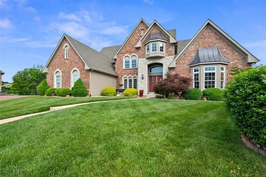 Welcome to this .48 acre Lakefront lot on a cul de sac w/ wonderful curb appeal that is just the start. This stately 1.5 sty brick & stone home is in the premier Spring Mill gated community. A 2-sty foyer opens to 19 x 14 private study, 16 x 13 dining room & stunning 25 x 19 great room w/ wall of windows & fireplace. Featuring beautiful millwork, arched entryways & oak hardwoods throughout the main living area. Designer 17 x 15 Kitchen w/ 12 x 11  breakfast room & 18 x 11 hearth room that leads to the 27 x 14 deck. Spacious 19 x 19 main floor master bedroom suite & luxury bath w/ jetted tub offers a relaxing treat, also a 19 x 8 WIC. 3 upper bedrooms, 1 w/ full bath & 2 w/ Jack n’ Jill bath. Walk-out Lower Level w/ 18 x 17 office or 5th bedroom w/ lake view & full bath, recreation room w/ fireplace, game room, coffered family room & media room w/ built-in entertainment center plus a wine room. 66 x 14' Brick Paver patio. 9' pour, 3 HVAC units & 3 hot water heaters. 2 year HPP included. Additional Rooms: Wine Cellar