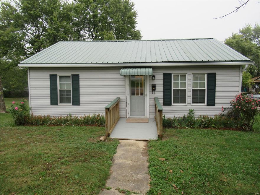 H2145 AFFORDABLE HOME! Nice corner lot. Vinyl sided 2 bedroom home with metal roof. Wood floors. Natural gas F/A furnace with central air. Utility room. Gas water heater. DH vinyl tilt-in windows. All appliances stay. Gas range. Deck. Storage shed. Seller is adding a dishwasher and fixing a few things in the house prior to closing.