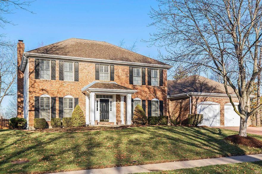 Stately 4 bedroom, 2.5 bath home situated on 0.28 acres in Des Peres with nearly 3800 sq. foot of living space. Dining rm. w/hardwood flooring, wainscoting & crown molding. Family room features built in bookcases, crown molding, wainscoting, & bay window. Serving pantry w/ ceramic tile backsplash & granite counter top. Breakfast rm. w/French door leading to paver patio & level, fenced backyard. Gourmet kitchen has granite counter top, ceramic tile backsplash center island, breakfast bar, planning desk, beverage and Sub Zero refrigerators. Spacious sitting/sun rm. is located off kitchen. Upper level features master bedroom w/ coffered ceiling, walk in closet & Ensuite master bath. Luxury master bath features custom cabinets, solid surface vanity top, double sink, over sized walk in shower & corner soaking tub w/jets. Hall bath w/ceramic tile, custom vanity, solid surface top & shower with tile surround. Finished LL boasts office, rec & family rm. Seller offering 1 year H.S.A. warranty.