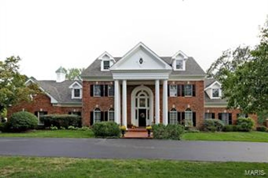 Exquisite 1.5 story, 6 bedroom, 7 bath home situated on one of the finest lanes in Frontenac. Spectacular 2 story entry, 1st floor master bedroom suite with 4 more bedrooms on the 2nd floor and in-law suite in lower level. Spectacular gourmet kitchen w/ high end appliances, two dishwashers, two ovens, custom cabinets, marble counters, breakfast bar and center island. Updated walk out lower level w/ huge bar, dishwashers, new full size refrigerator and wine refrigerator, granite counters plus family room and game room.  Salt water pool and gazebo on beautiful acre lot backs to open ground. Many updates include newer roof, carpet, wood flooring,  and special finishes throughout.