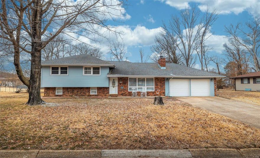 Highest and Best offers due by 10:00am on 2/28/25. Welcome to this beautifully updated 4-bedroom, 2-bathroom home, perfectly situated in a peaceful neighborhood. Located within walking distance to stores, movie theater, local parks and less than a 15 minute drive Fort Leonard Wood. The home features stunning hardwood floors and a cozy wood-burning fireplace, the living room offers warmth and charm. The updated kitchen boasts stylish cabinets, slide out shelving, granite countertops, and ample storage. Three spacious bedrooms are located on the upper level, while the lower level includes an additional bedroom—ideal for guests or a private retreat. Enjoy the updated bathroom with a luxurious walk-in shower, and step outside to a covered back porch overlooking the large, flat, and private backyard—perfect for outdoor entertaining. A spacious two-car garage completes this must-see home. Schedule your showing today!