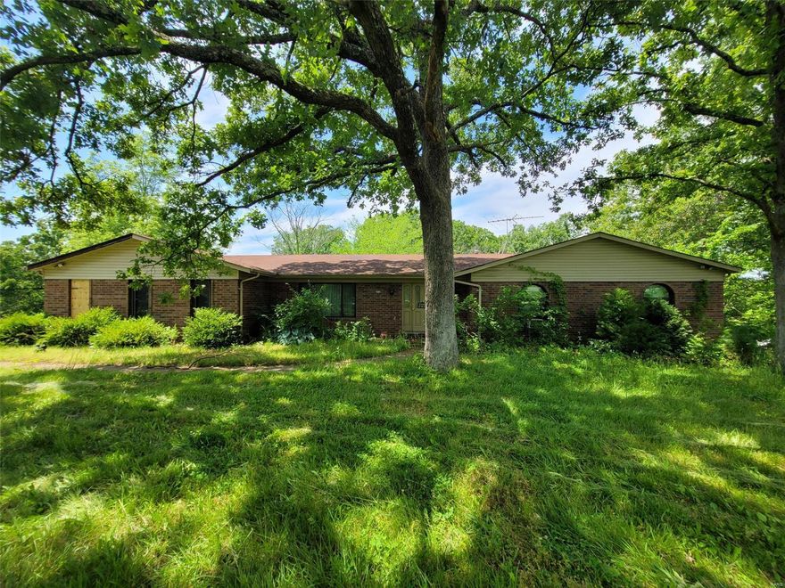 Outstanding opportunity! Sprawling ranch home situated on over 7 acres! Home boasts spacious rooms, outbuilding, and much more! Home sold as-is. Seller to do no repairs or provide any inspections.