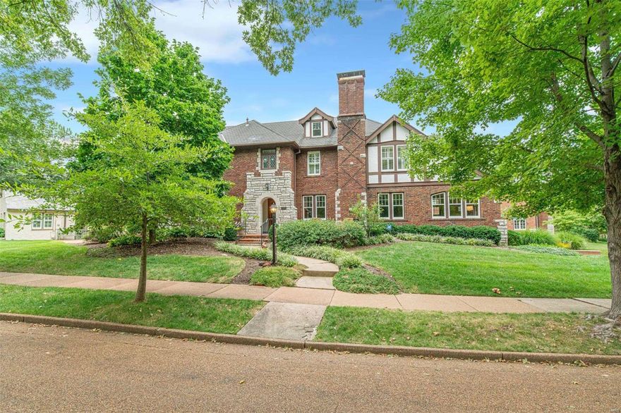 Incredible and immaculate! You know this house - the house on the curve. 7298 Greenway has been painstakingly restored by the current owners, with no detail overlooked. The intricate moldings, millwork, came glass windows, and ironwork are all exquisite. Graciously sized rooms throughout, with lovely natural light. Replacement of HVAC, electric, plumbing, sewer, windows, and roof will give the next owner peace of mind. The newer addition blends seamlessly with the original home - featuring a towering family room with 13' beamed ceilings, french doors leading out onto one of the patios, and an oversized two-car garage. The finished 3rd floor can function as separate living quarters with a rec room, bedroom, and a full bath - perfect for guests or a nanny. The enormous basement is so clean and dry; you could eat off the floor. All of this and more, located on one of the most prestigious streets in University Hills, and within walking distance to downtown Clayton!