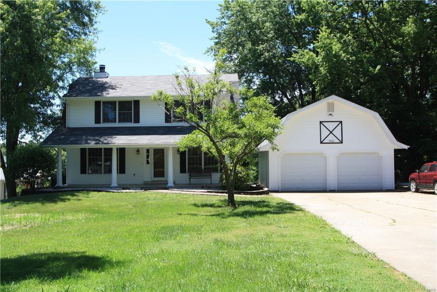 .97 Acre for pure loving the outdoors.  This early American style 2 story sits on the property so sweetly, and there are no subdivision restrictions. Many updates throughout the years, spacious kitchen with granite counter tops, Center Island, plenty of cabinets, ceramic flooring and some newer appliances. Family room w/lg. windows, wood burning fireplace. Sep. Living and Dining room,  Hardwood floors and crown molding throughout main and upper floor. Mstr. Suite with adult size sink, Lg. walk in closet, and lg. window overlooking the huge backyard. Upper level w, 2 large bedrooms, full updated baths. Main Floor laundry adjoins the 1/2 bath on main floor.  A full w-out basement, w/rec. room, and office or sleeping room and plenty of storage. The detached garage is (20 x 24) and just what the mechanic or handyman is looking to purchase  A piece of tranquility in the heart of St. Charles County.