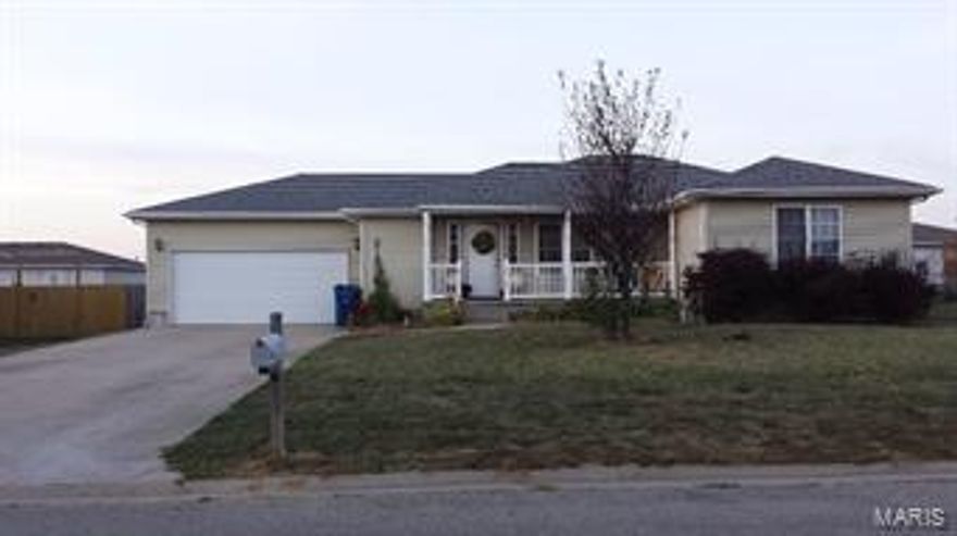 Great family home in well located neighborhood. This is not just an ordinary 3 bedroom 2 bath house, this home features a covered front porch with pretty railing, a unique wood ceiling with indirect lighting in the living room and lots of storage in the utility room. Don't miss this move in ready home.