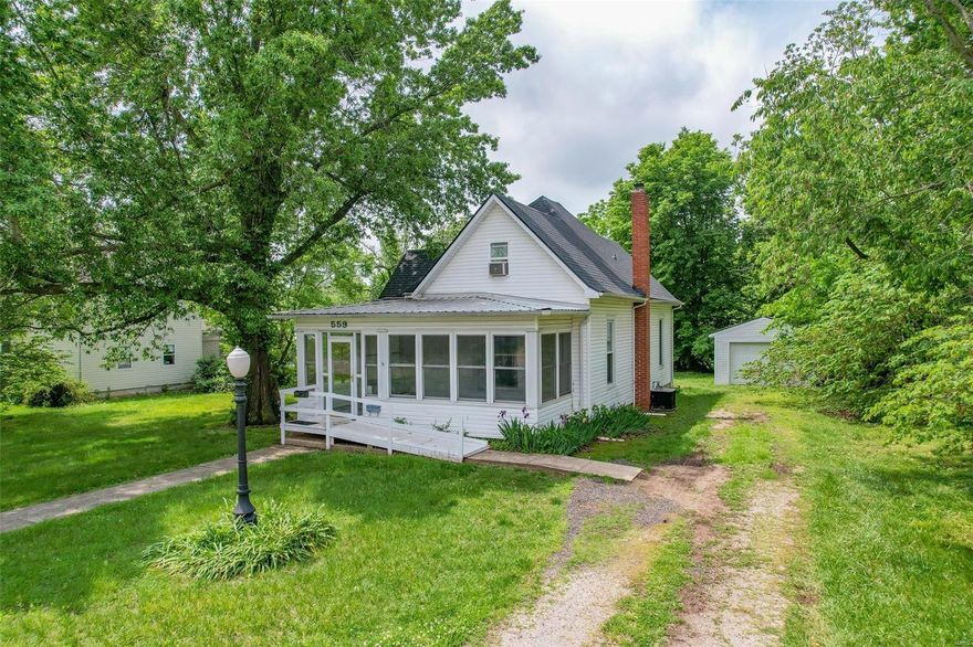 Beautiful home in the heart of Lebanon. This charming property has lots of character and a feel of yesteryear but is updated and offers all the amenities that a modern family desires. First thing you see, and experience is bright and spacious screened/glassed in porch that you will enjoy while spending your time during warm mornings and evenings. Upon your entrance you will notice beautiful hardwood floors, crown molding, built-in shelves and cabinets offering abundant storage throughout the 4 bedrooms and 3-and-a-half bathrooms. The Master suite is located on the main level, with a large bathroom with double closets, whirlpool tub, and a separate shower. Backyard is large and leveled. Detached garage has separate workshop/hobby area.