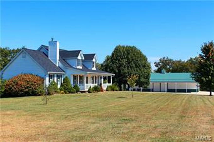 Are you ready for country living at it's best? This is one of the most beautiful settings you will find on the market! Located in the southern part of Pike County is 119 Ac m/l with all the amenities you would desire for both the cattleman or horse lover! The 1/4 mile private driveway sets the mood for this country retreat as you approach the custom 1.5 story home that backs up to the timber and meandering creek. The home boasts over 4,000 sqft and includes 5 bdrms, 4baths. There is also a 1,000 sqft guest/pool house w/ covered patio that overlooks a 980 sqft in-ground pool with large concrete pool deck and beautiful landscaping. The Morton machine shed is 75x42 w/ 12' covered lean-to. This machine shed includes concrete floor and some utilities. The second Morton building is 43x60 and has been used for horses in the past. The third barn is 60x120 and is used for working cattle and hay storage. There are 4 auto-waters that service the 71 acres m/l of pasture land. Owner may divide.