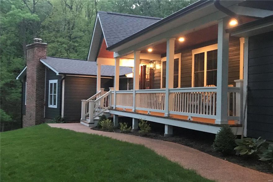 Fabulous total home renovation!This 4 bedrm,3.5 bath home has 3,837+/- sqft & is situated on 3.5+/- wooded acres in the private, serene, picturesque enclave of Christmas Valley. ML boasts the kitchen feat impressive vault & beam ceiling,leathered granite ctr isle,quartz counters,custom cabinetry & Bosch SS appls.Family rm flaunts vault beamed ceiling w/shiplap, flr-to-ceiling stone WB FP & wood flr.Living rm w/vault beamed ceiling w/shiplap,brick FP w/WB stove & wood flr.UL only 6 steps up, offers primary suite w/vaulted ceiling,wood flr,WI custom closet & lux bath w/dual sink granite vanity,freestanding tub & tile shower.Other 2 bedrms have vault ceilings & wood flrs one w/ensuite bath,w/door to hall,shared by 3rd bedrm.WO LL offers rec rm w/WB stove,full bath,4th bedrm & storage.Outside is a covered front porch,covered side deck, patio & firepit area & out back a paver stone patio. Easy access to Hwy 40,Chesterfield Vly & Wildwood Town Ctr amenities allows the best of both worlds.
