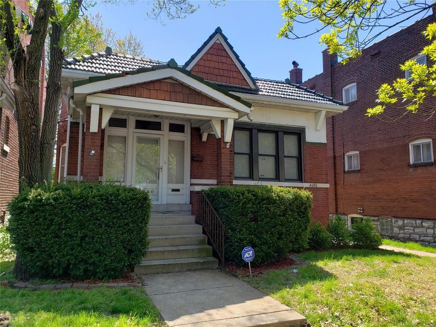 This is a great solid brick house with a fantastic floor plan! Lots of tasteful updates that include kitchen with white custom cabinets, granite countertops, gas stove, microwave and center island. The bathroom has the feel of being at a spa! Gorgeous hardwood floors throughout, gas log fireplace, open flow, french doors, landscaped backyard with a pergola and patio. Bonus-home has dual zoning for residential and commercial with a lower level entrance. Could be a perfect space for art, yoga, music, bakery or simply ordinary basement space, the possibilities are endless. Completely move in ready! Don't miss this gem!