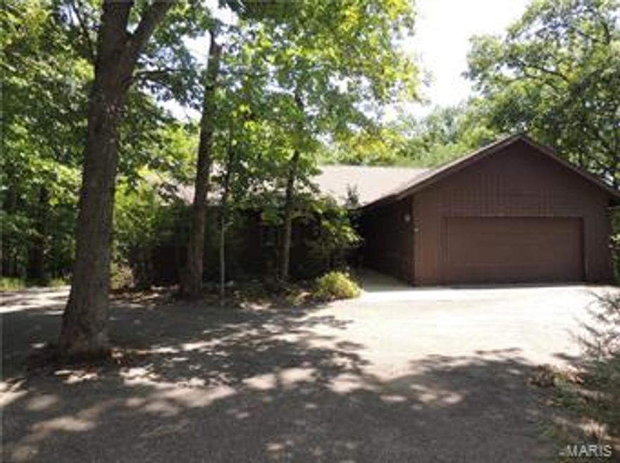 Community living in a resort atmosphere. 570 Aspen View offers a private setting, yet excellent proximity to the championship golf course, tennis courts, 150 lake Aspen and the main entrance. Custom home features a specious great room with wood burning fireplace, ML MBR suite, guest bedroom and bath and private den. Eat in kitchen offers views of the surrounding forest, spacious deck provides a great place for all of your outdoor entertaining needs. Full unfinished basement allows for future expansion. Wintertime views of lake Aspen, short drive to the new Charrette Creek commons featuring a pool, lazy river, fitness center and the outdoor concert venue