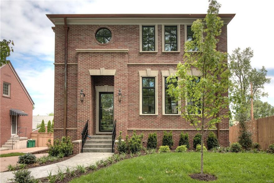 Clayton Gardens new home features classic architectural design w/ a transitional finish inside. Belovo gas lanterns & an 8' wrought iron/glass front door leads you to a 2 story entry. 10' ceilings on the main, wood floors throughout 2 floors, tall base moldings & palate of soft grey & white hues conspire to create the perfect blend of sophistication, space & light. Enjoy entertaining in the spacious Kitchen/Breakfast/Hearth Rooms. The Kitchen features White Danby marble, SubZero fridge, Wolf 6 burner gas cooktop & dbl oven. Glass inlaid Markus cabinetry & walk-in pantry.  Hearth room w/ fireplace opens to composite deck w/ iron rail. 2nd fl features 4 beds & 3 full baths, laundry & master w/coffered ceiling & huge custom closet. Master bath has double vanities, free-standing tub & large shower. Exquisite decorative & recessed lighting, Emtek hardware, in-ceiling speakers. 5th bed & full bath in LL creates a home offering unprecedented quality. Optional 3 stop elevator. 2 Car garage.